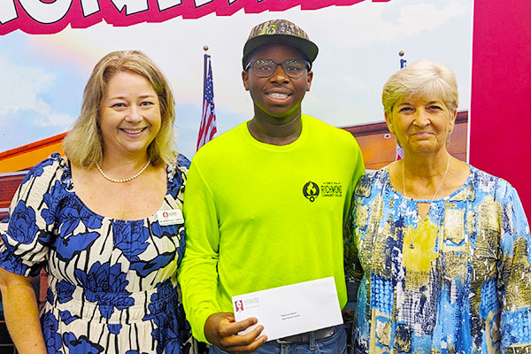 Student with scholarship donors