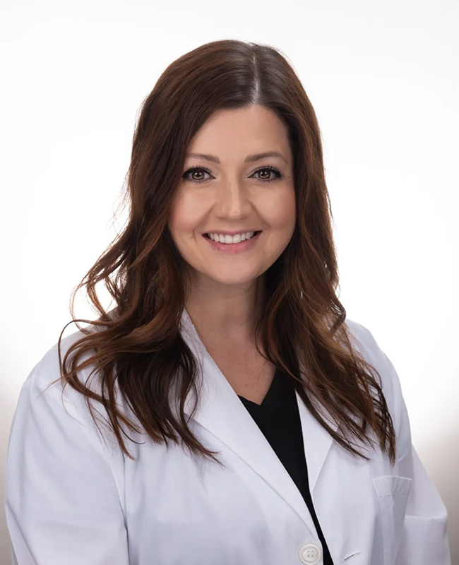 Lauren McDonald wears a nurse's uniform